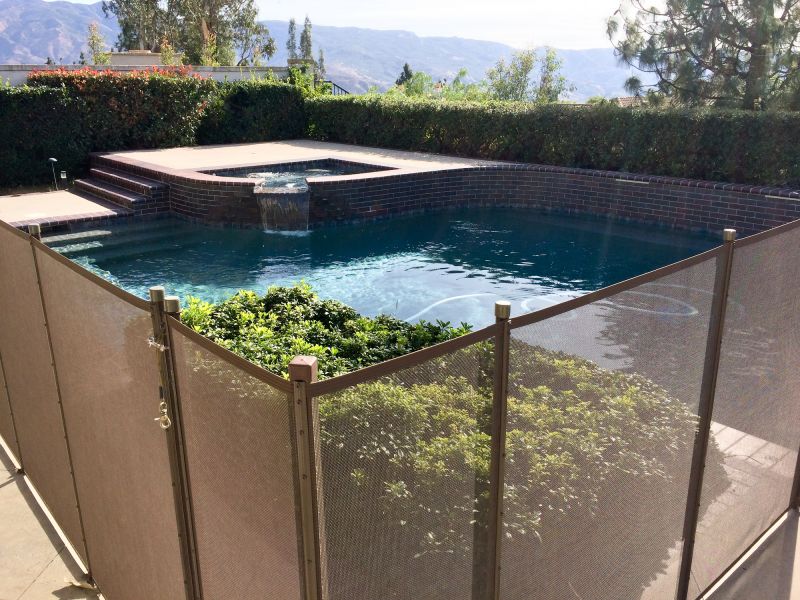 Mesh Fence Surrounding Pool